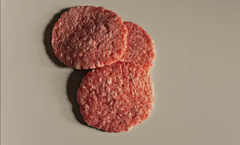 Ultra-processed beef burger meal high in fats and additives